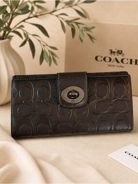 Coach Silver Embossed Signature Turnlock Wallet